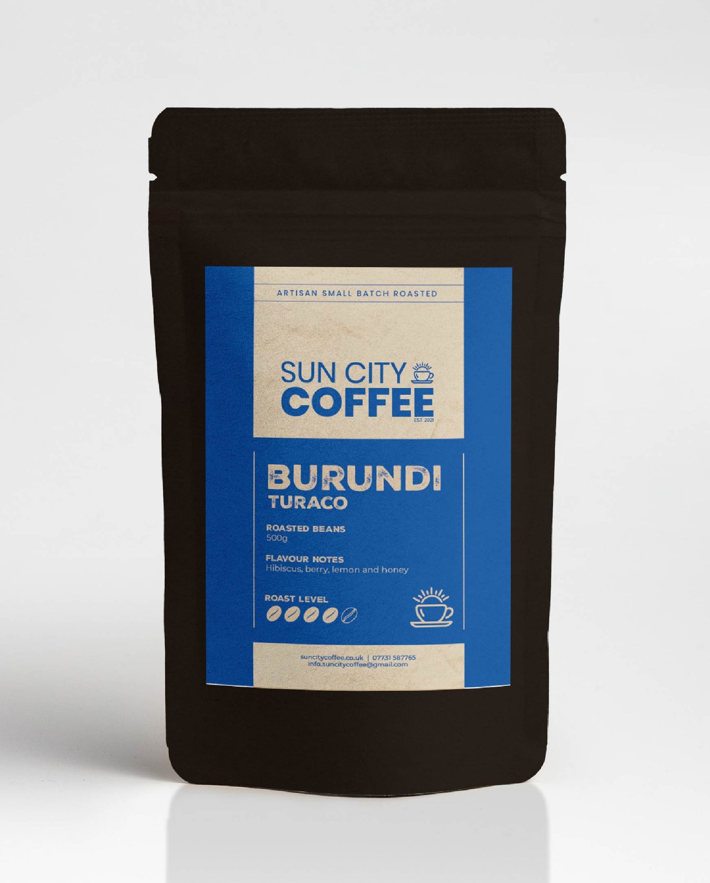 A pack of Sun City Coffee Burundi Turaco single origin coffee with blue label and black bag
