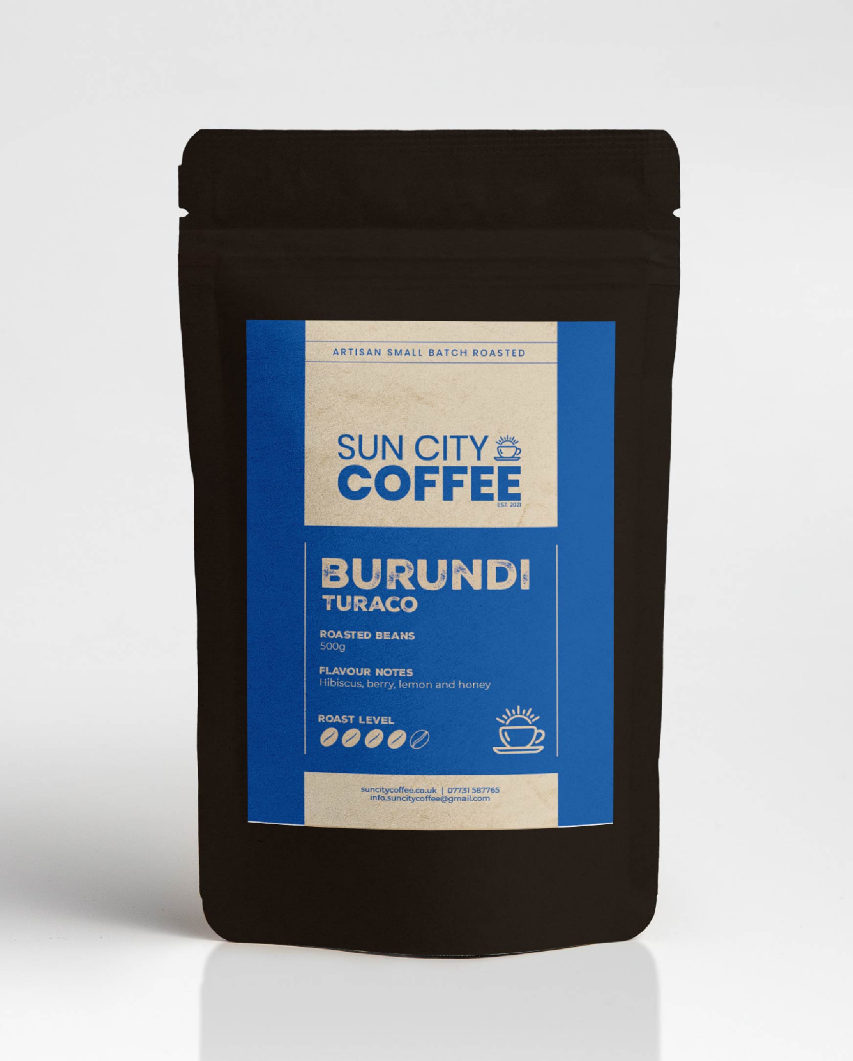 A pack of Sun City Coffee Burundi Turaco single origin coffee with blue label and black bag